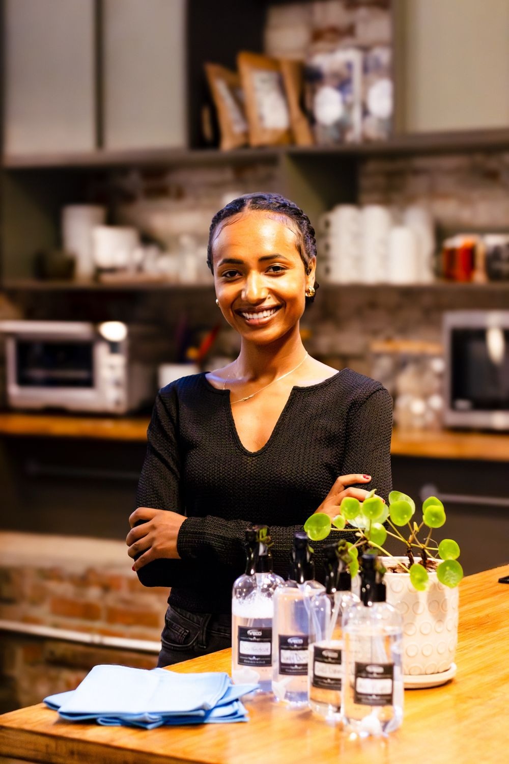 Addi Holmes, owner of Clean Holmes, with her cleaning supplies